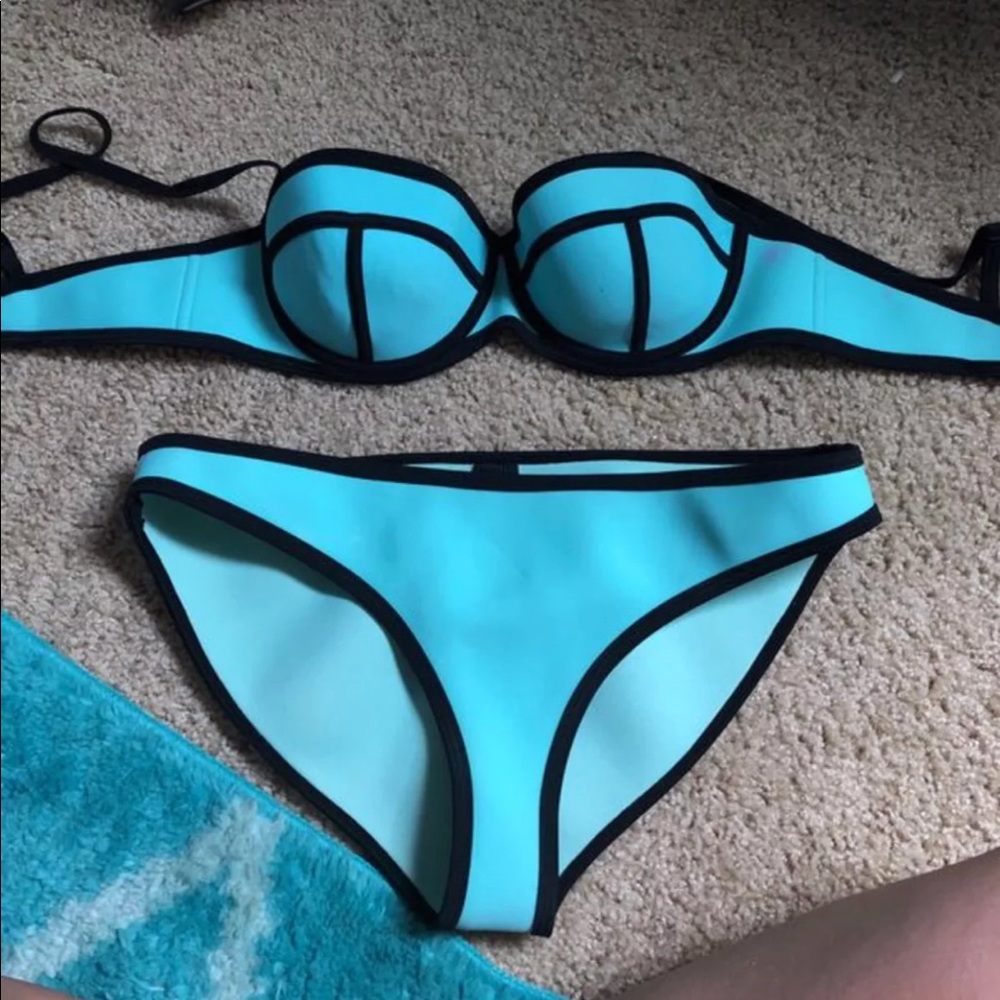 Authentic Triangl bathing suit.